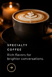 Latte art served in a dark ceramic cup